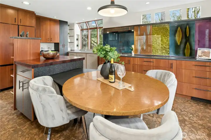 This Birdseye Maple table was custom made for the home and will remain.