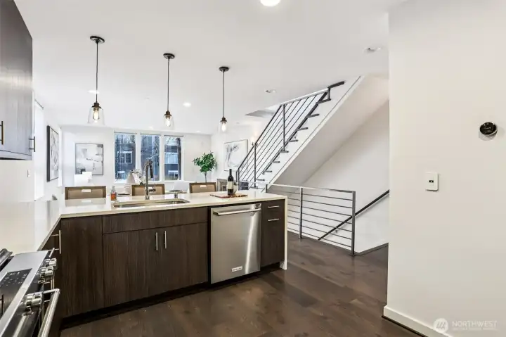 Kitchen facing dining and living room.