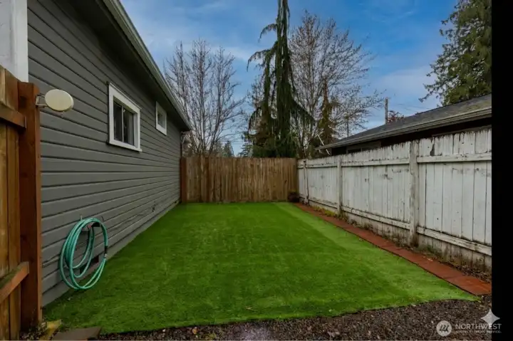 Private Backyard with Low Maintenance Turf