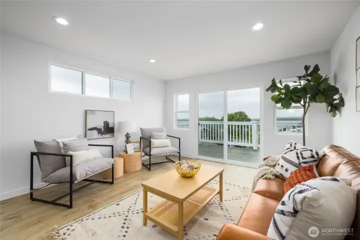 Enjoy beautiful bay views year-round. Slider leads out to excellent entertainment deck