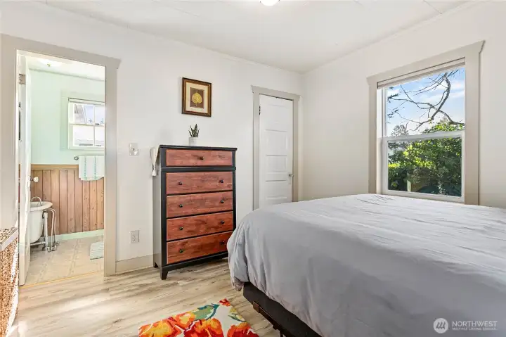 Bedroom on west side of home with bathroom access