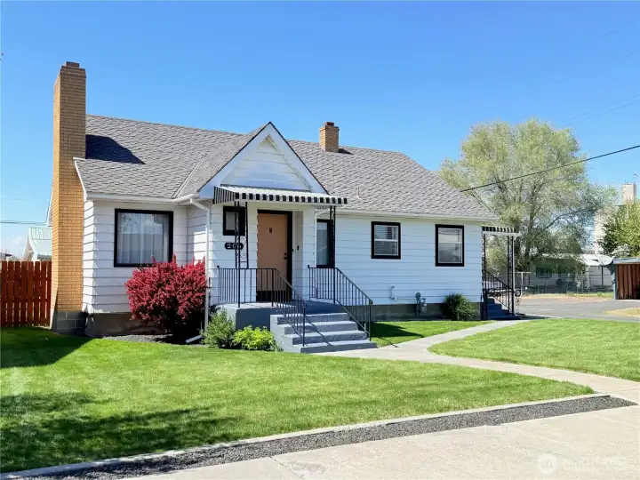 Inviting front entry with mature landscaping