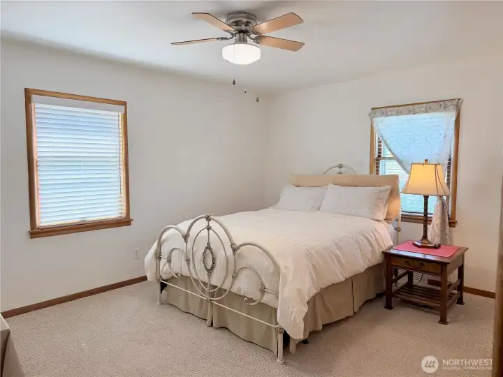 Generously sized bedroom with ample natural light