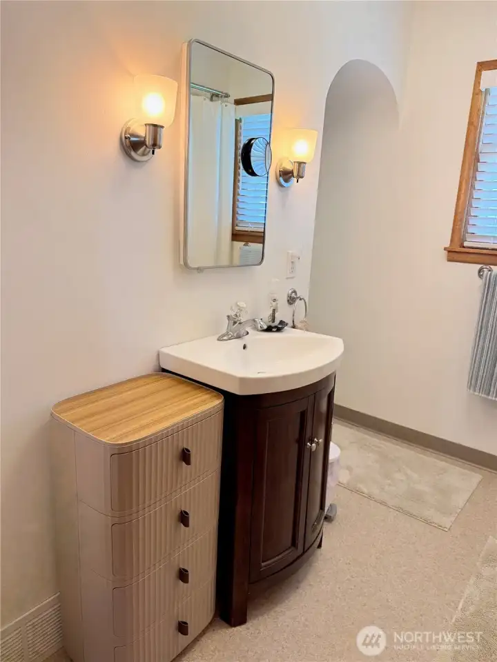 Updated bathroom with vanity storage