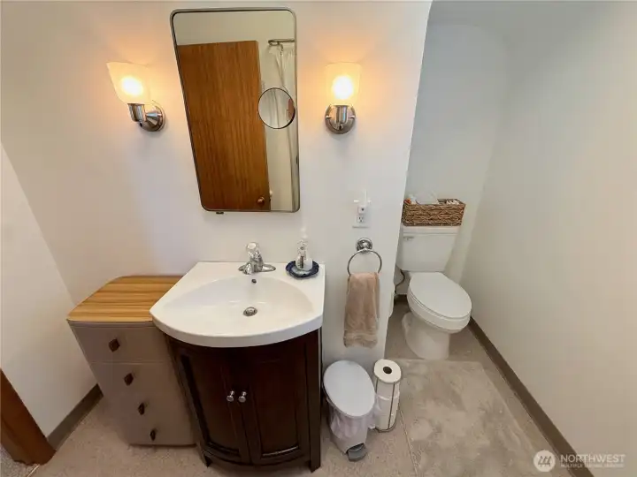 Full bathroom with clean, functional layout