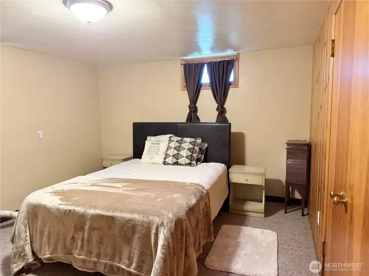 Comfortable basement non-conforming bedroom
