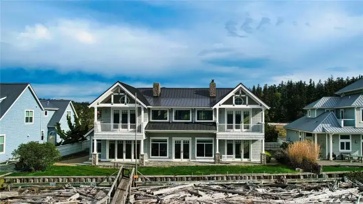 Fantastic Elger Bay shore home with southern exposure. The perfect location to watch storms come through or enjoy the weather anytime. There is a gorgeous slate patio, covered area, a porch swing and even a hot and cold facet to clean feet after beachcombing. Watch the sea life right in your front yard.