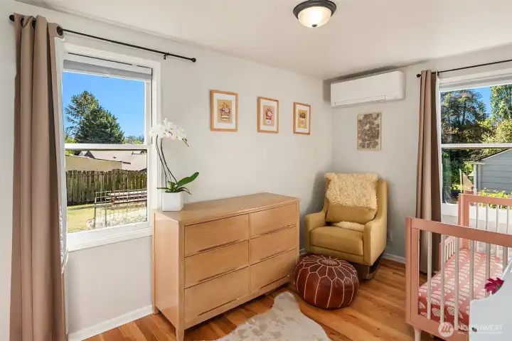 Spacious second bedroom on upper level, overlooking the lovely, peaceful backyard