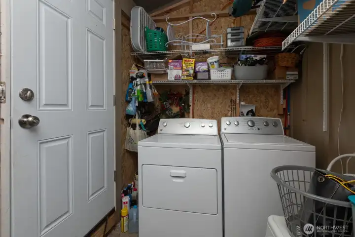 Second laundry room on back deck used for studio tenant.