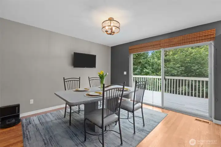 Dining area with slider door to the deck