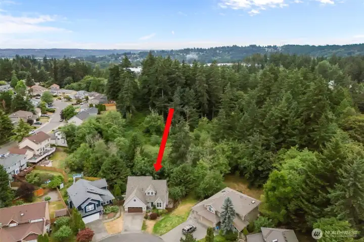 A peaceful neighborhood setting with convenience all around.