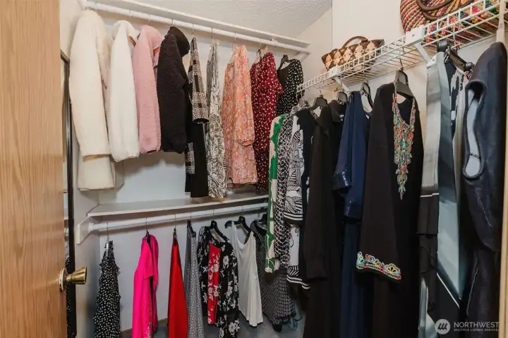 Primary walk-in closet Primary walk-in closet