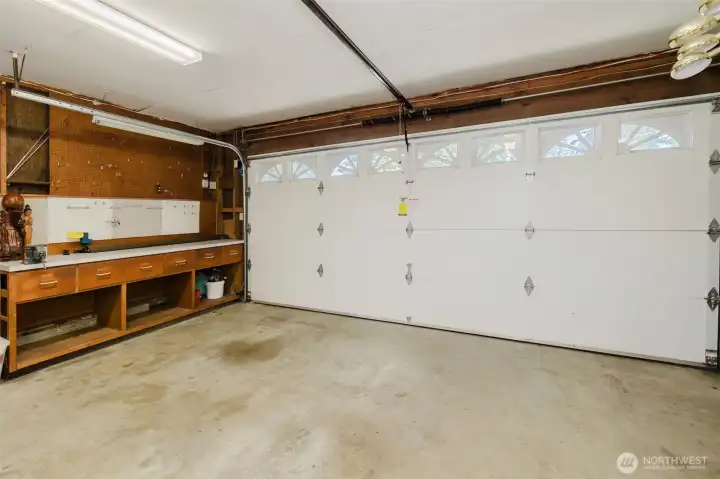 Very clean garage with shelving Very clean garage with shelving