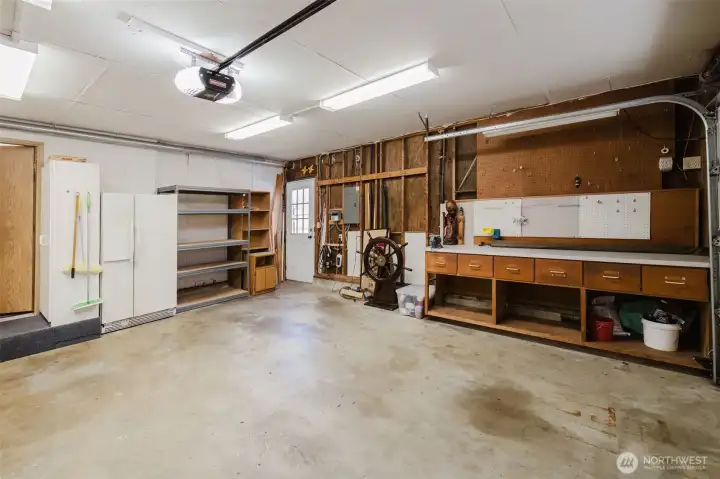 Very clean garage with workbench Very clean garage with workbench