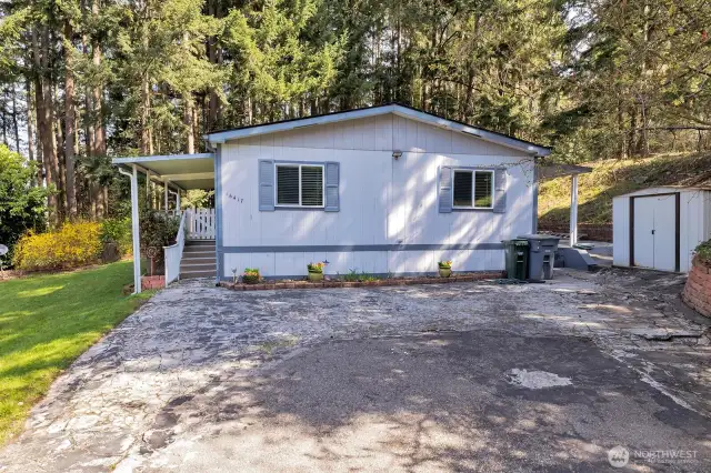 Drive way parking will easily accommodate 2 owner vehicles and additonal guest parking for visitors. Install a carport with park owner approval is an option.