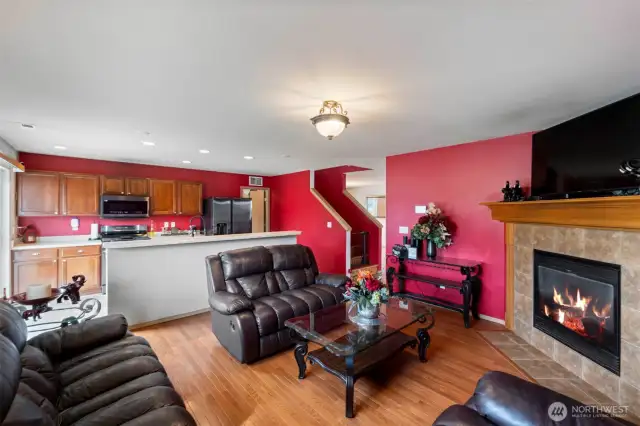 The family room offers comfort and accessibility, creating the perfect spot to unwind or enjoy movie nights.