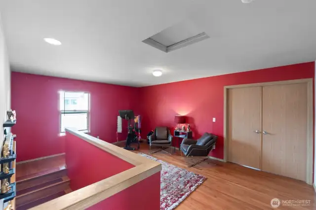 Upon reaching the upper level, a spacious loft awaits, providing the perfect flexible space to suit your needs.
