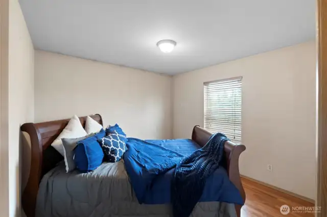 Two of the three guest bedrooms are located on the upper level, providing a comfortable and private retreat.