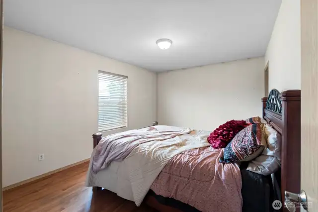 Three of three guest bedrooms. All three guest bedrooms are located on the upper level, offering a dedicated and private space.