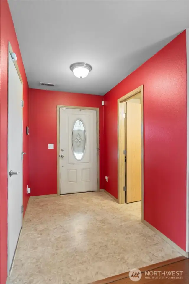 Looking back on the front entry find a powder room located on the main level.