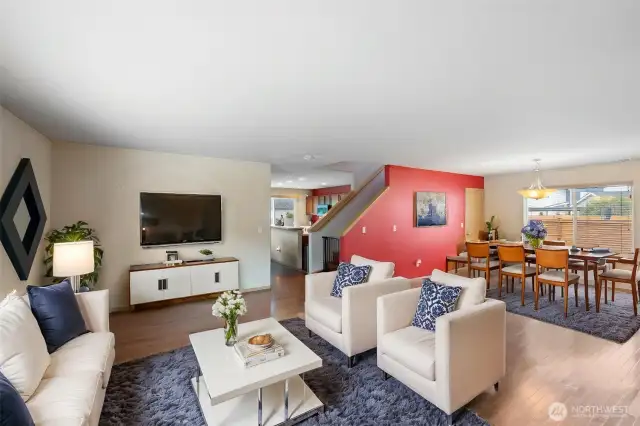 The formal living and dining rooms offer versatile space—ideal for entertaining, a home office, or creating your perfect gathering area.