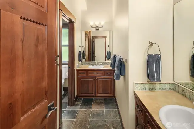 Full bath with 2 vanities.