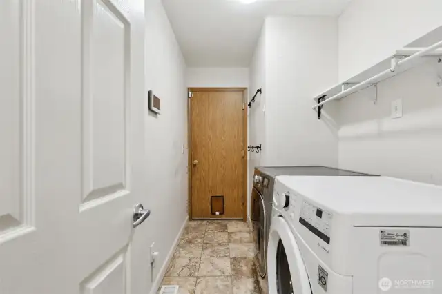 Laundry looking towards the door to the garage