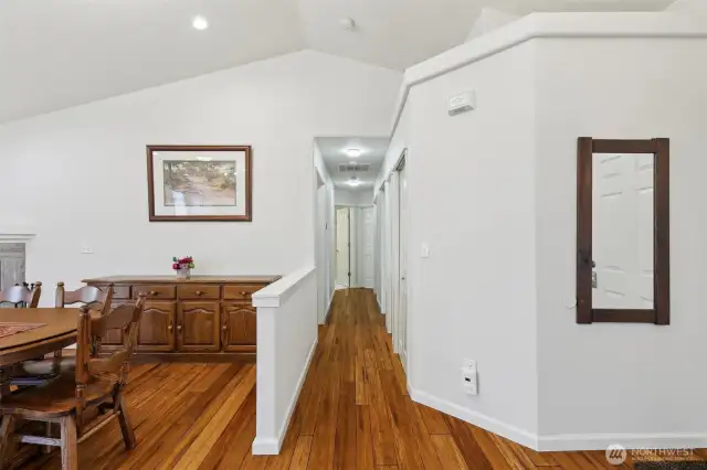 Hallway with Dining Room to the left, entrance to the right