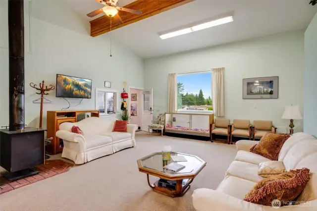 Spacious clubhouse lounge perfect for social events and cozy get-togethers.