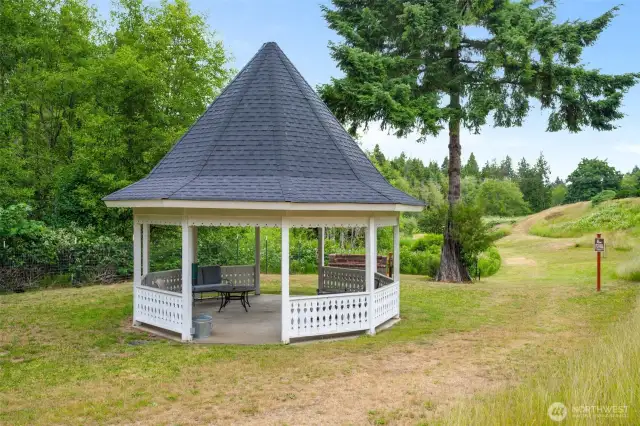 Peaceful community park featuring a gazebo & walking trails to enjoy fresh air and quiet moments outdoors.