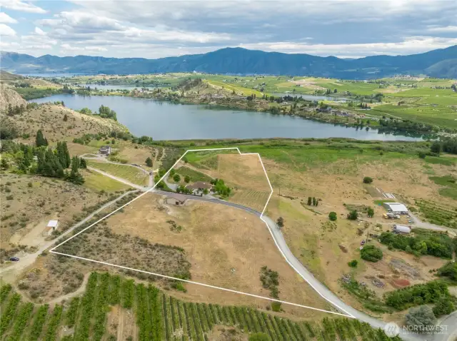“Luxury Country Living with Vineyard, Views & Buildable Acreage”