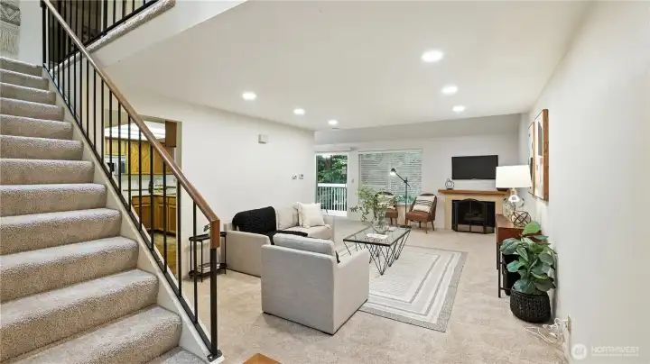 Admire the spacious staircase adorned with an elegant railing, adding a touch of sophistication to the home