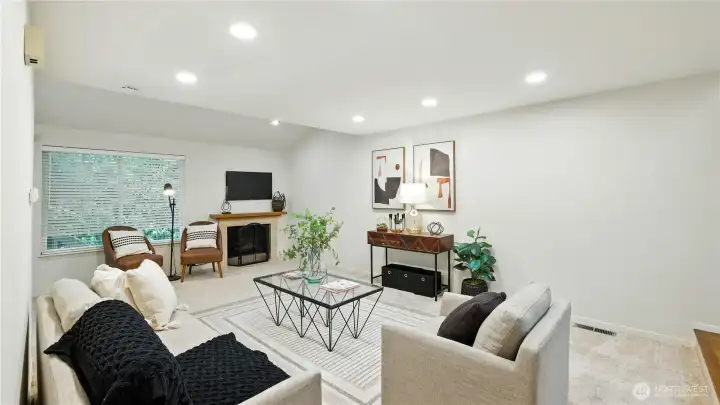 Gather around this inviting fireplace accented with elegant tile, surrounded by open living space ready for your custom furniture choices