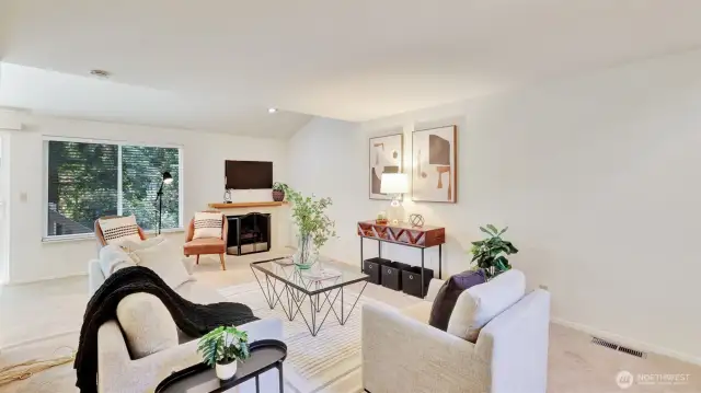 Gather around this inviting fireplace accented with elegant tile, surrounded by open living space ready for your custom furniture choices