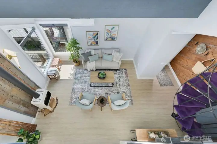 Looking down on loft railing to main floor