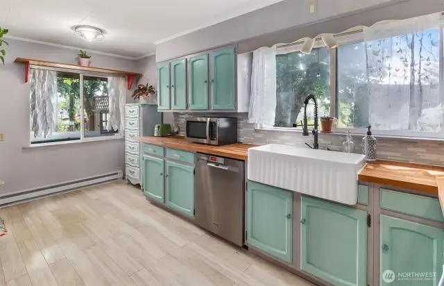 Updated kitchen with farm sink and plenty of room to bake