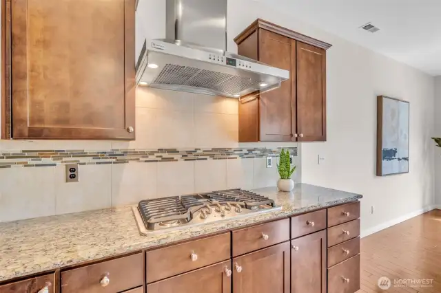 Rich cabinetry with soft-close doors.