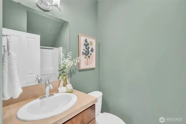 Main floor 3/4 bath-- yes, there is a shower which you can see in the mirror!