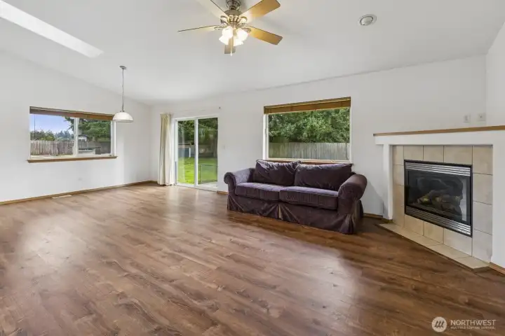 Access the back yard through the sliding doors directly off the living room