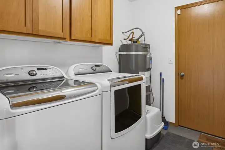 Laundry with cabinets