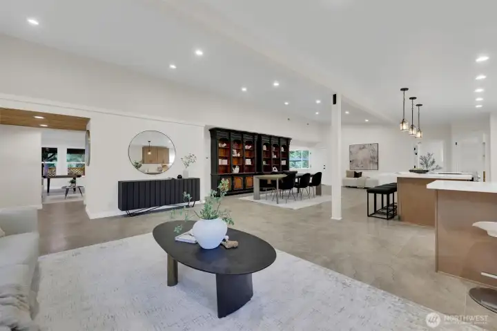 Vaulted ceilings and natural light give this space a cozy, open feel. Open concept.
