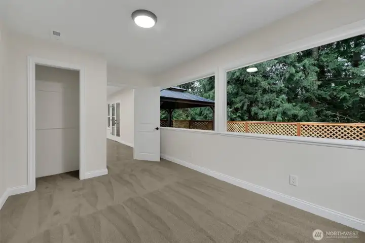 Updated windows in this 2nd bedroom bring energy efficiency and style.