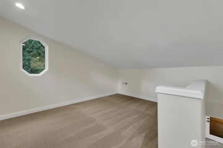 Bonus loft bedroom, perfect for guests, a playroom, or creative space.