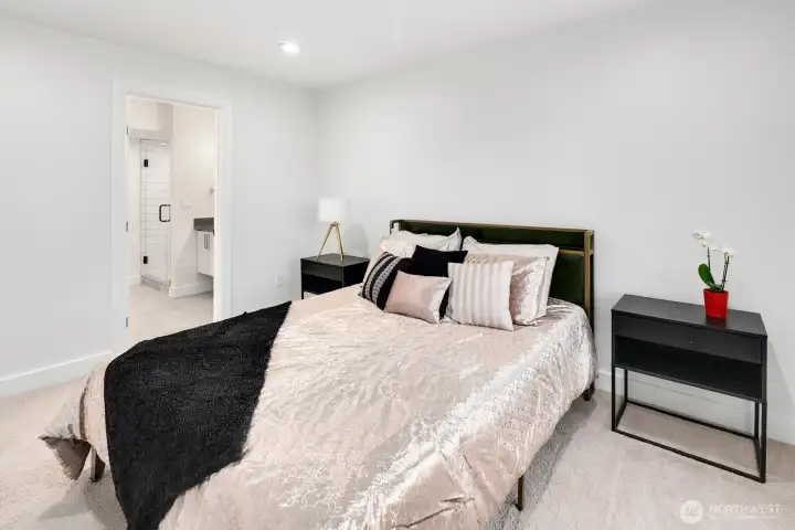 upper level primary bedroom with ensuite bathroom