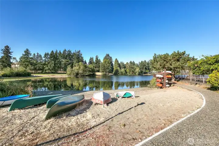 Private beach where kayaks and paddle boards can be stored for fun times at and on the lake.