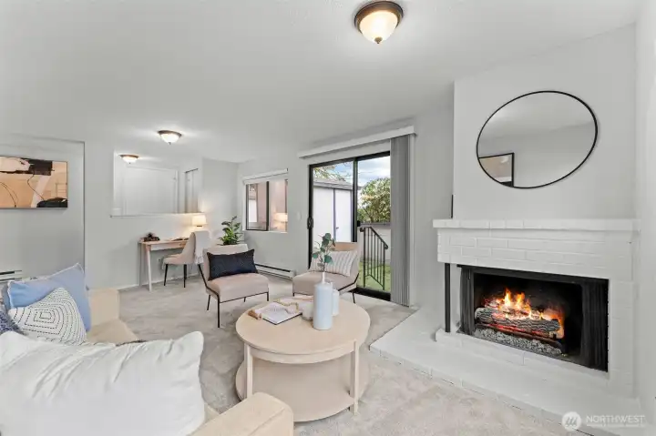 Thoughtfully staged with cozy seating and contemporary accents, the space feels both comfortable and refined—perfect for relaxing or hosting guests.