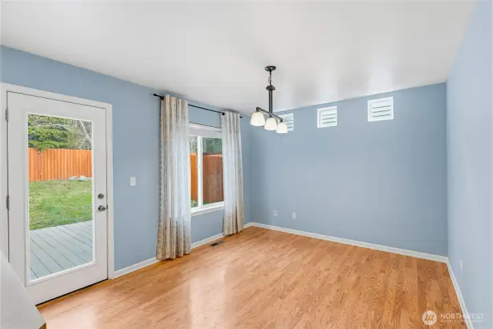 Eating space with door to the back yard.