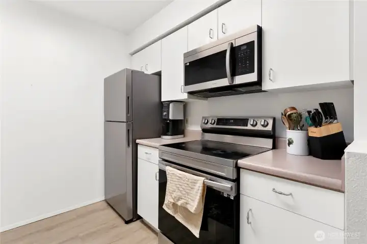 Stainless appliances and nice updated flooring. Lots of storage space.