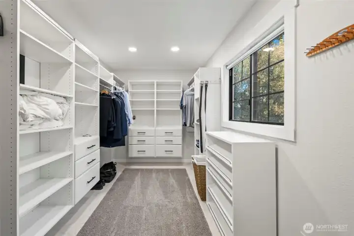 Custom closet with built ins and natural light!