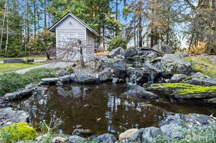 Tranquil pond out front.